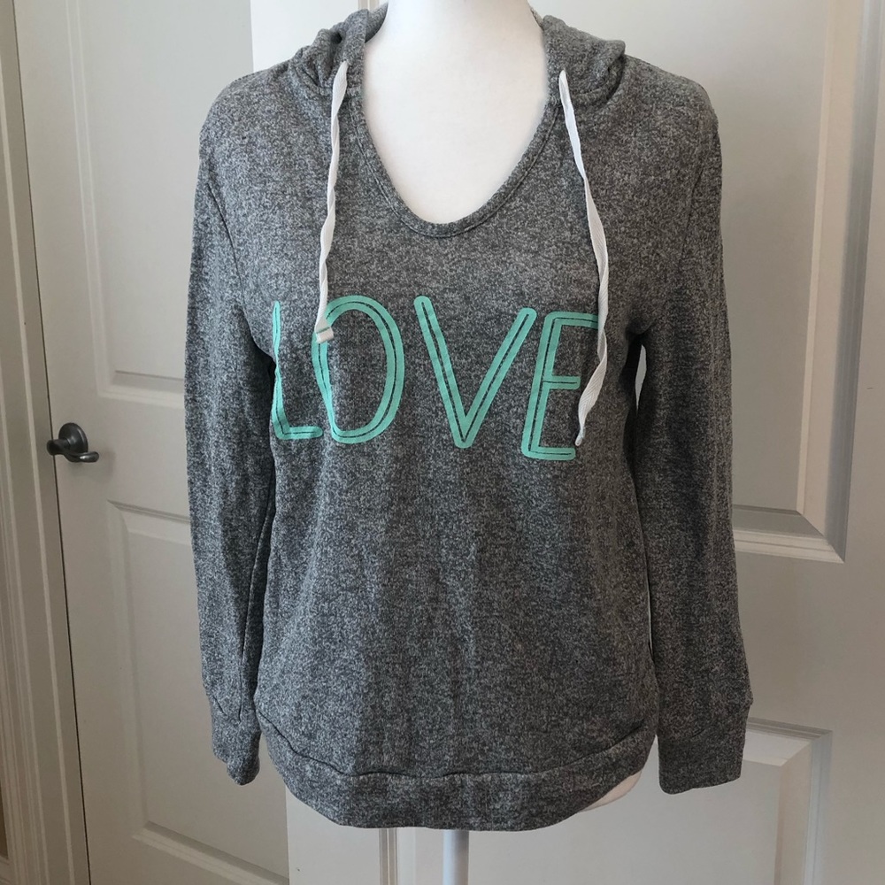 Woman’s Crisscross Back Love Sweatshirt